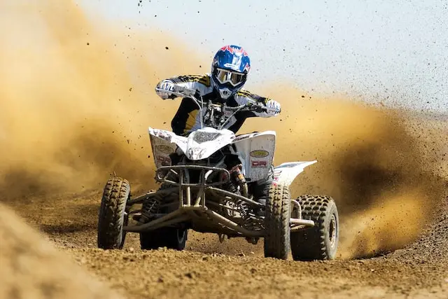 A driver driving an ATV very fast